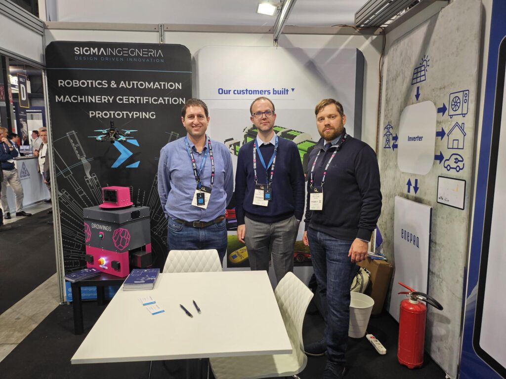 Sigma Ingegneria partners and Enepaq sales manager Jurijus at Enlit 2024 showcase their energy storage solutions.